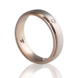 Alianza de boda bicolor con diamante