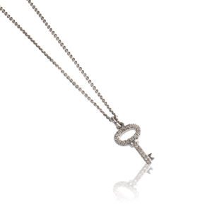 Colgante llave de oro blanco